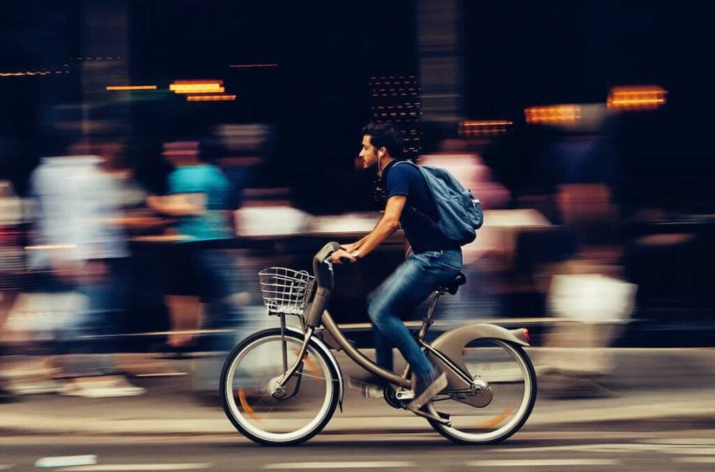 Bikes will lead the way towards our electric future 2 Electric bike picture man in the city